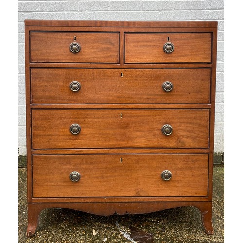 411 - A Georgian mahogany chest of drawers, fitted with two short over three long drawers -