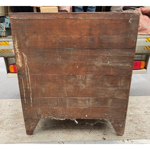 411 - A Georgian mahogany chest of drawers, fitted with two short over three long drawers -