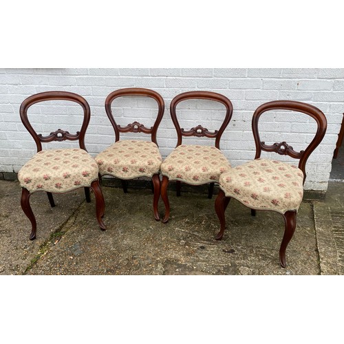 413 - A set of Victorian balloon back dining chairs -