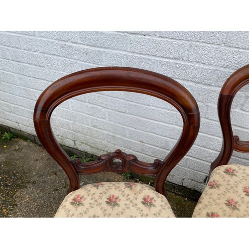 413 - A set of Victorian balloon back dining chairs -