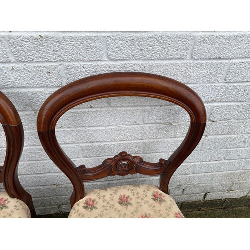 413 - A set of Victorian balloon back dining chairs -