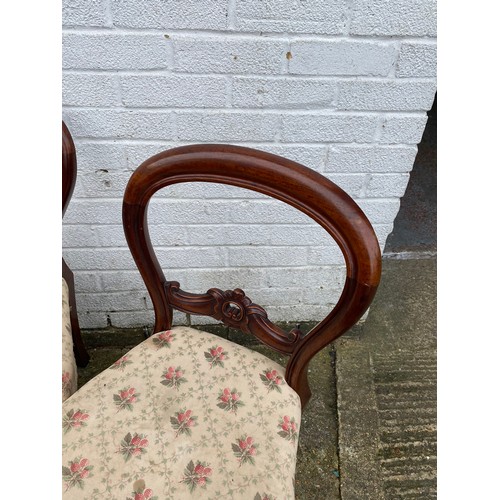 413 - A set of Victorian balloon back dining chairs -