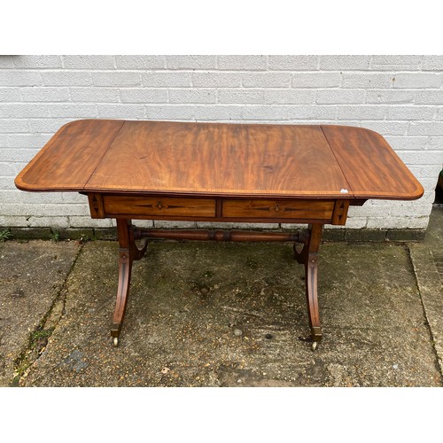 415 - A Georgian style mahogany and crossbanded sofa table, with inlaid detail, with typical drop ends and... 