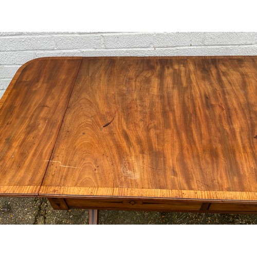 415 - A Georgian style mahogany and crossbanded sofa table, with inlaid detail, with typical drop ends and... 