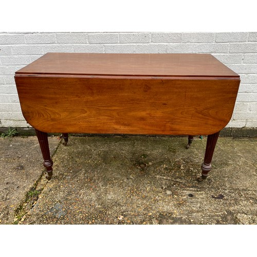 417 - A Victorian mahogany Pembroke style table, with end drawer and turned legs -