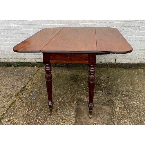 417 - A Victorian mahogany Pembroke style table, with end drawer and turned legs -