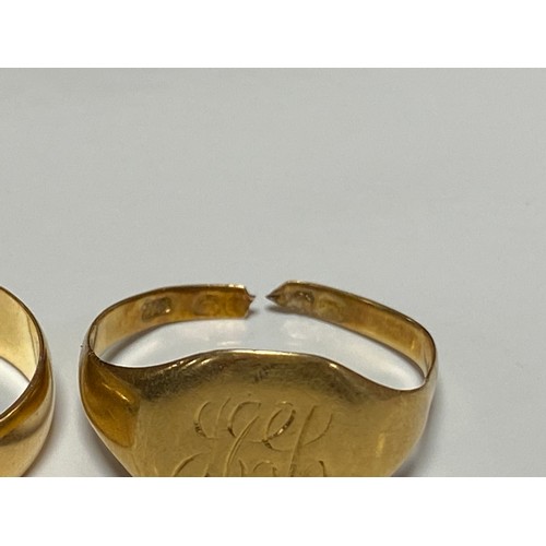 3 - An 18ct gold wedding band and an 18ct signet ring (cut) -