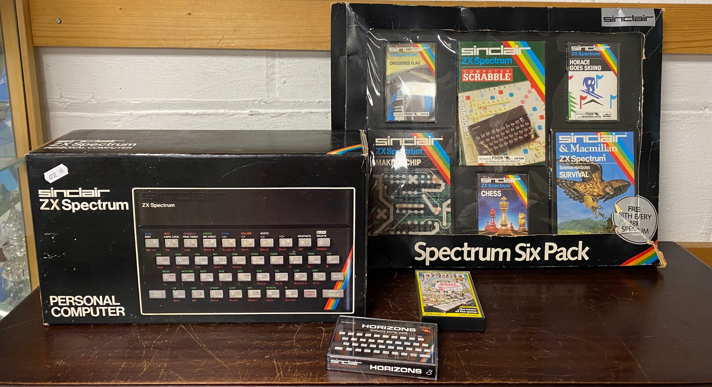 A vintage Sinclair ZX Spectrum 48k personal computer and six pack of ...