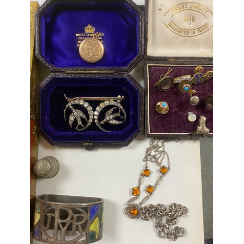 134 - A 9ct gold back and front locket together with odd earrings and a quantity of costume jewellery and ... 