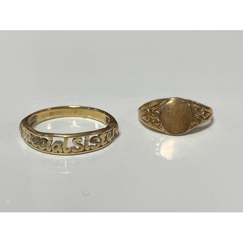 167 - Two 9ct gold rings, the first spelling 'Special Sister', the second a small signet ring (2) -