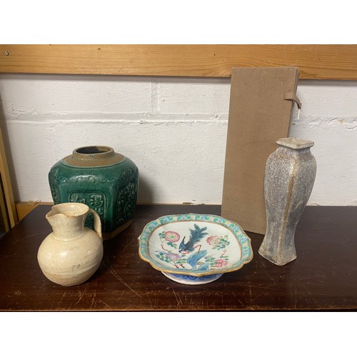 611 - A Chinese famille decorated footed dish, seal mark, a/f, with a green glazed jar, a vase and jug (4)... 