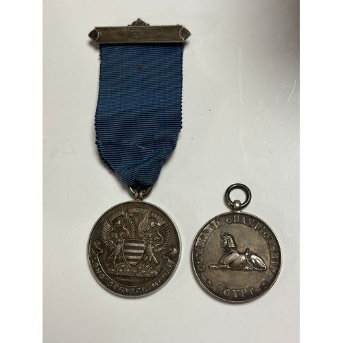 15 - A 1920s NAAFI Command Championship Cairo District Water Polo League medal, together with silver Long... 