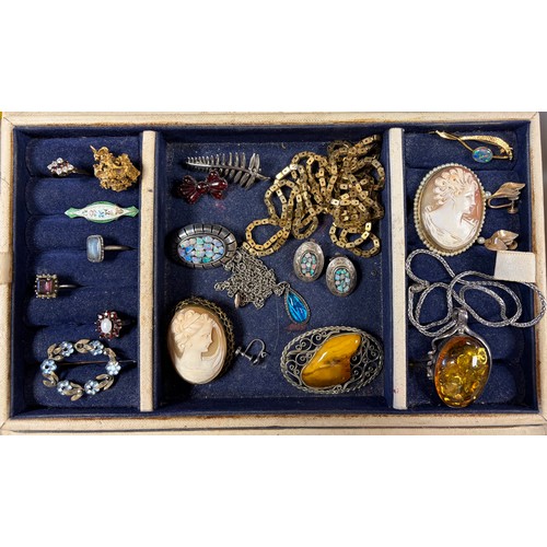 21 - A jewellery box and contents -