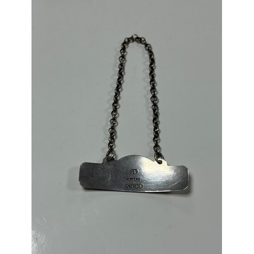 25 - A George III Irish silver 'Port' decanter/wine label, hallmarked for John Egan of Cork, Dublin 1812 ... 