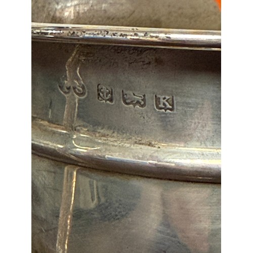 36 - A George V silver trophy cup, Birmingham 1934, with twin handles, presentation inscription for Bourn... 