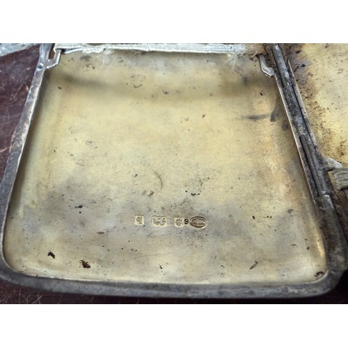 38 - An Edwardian silver cigarette case, Birmingham 1901, together with a silver covered trinket box, a c... 