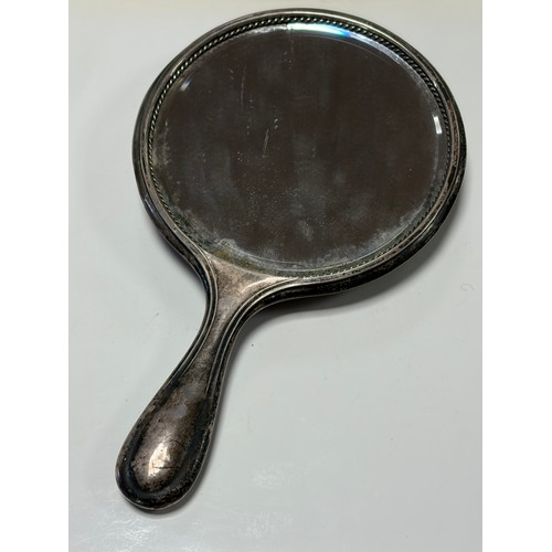 45 - An Edwardian silver dressing table mirror, Birmingham 1910, with swag and garland decoration -