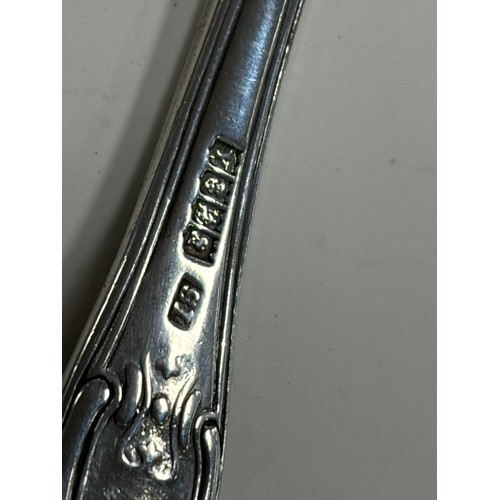 51 - An Irish silver spoon, Dublin 1869, together with another silver spoon -