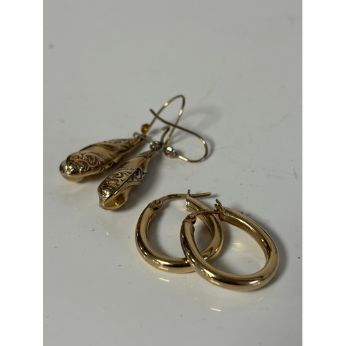9 - A pair of 9ct gold earhoops and a pair of 9ct gold ear pendants -