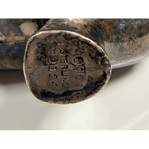 14 - An American silver shoe, stamped Sterling, together with silver handled hooks, plated vesta, etc-