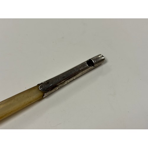 9 - A silver mounted horn spoon, with whistle mount -