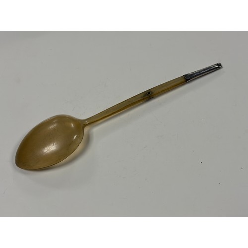 9 - A silver mounted horn spoon, with whistle mount -
