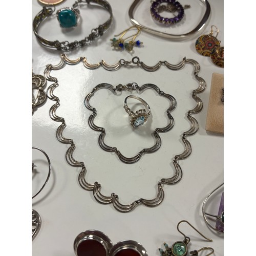 22 - A silver necklace and bracelet suite, together with a silver bangle and other silver and costume jew... 