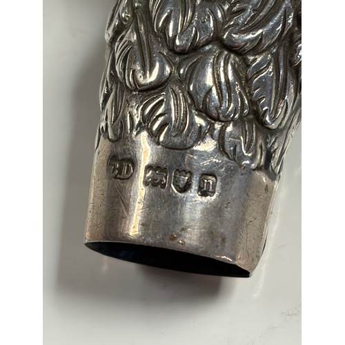 29 - An Edwardian silver umbrella/parasol handle, London 1908 and signed Brigg in the form of a bird's he... 