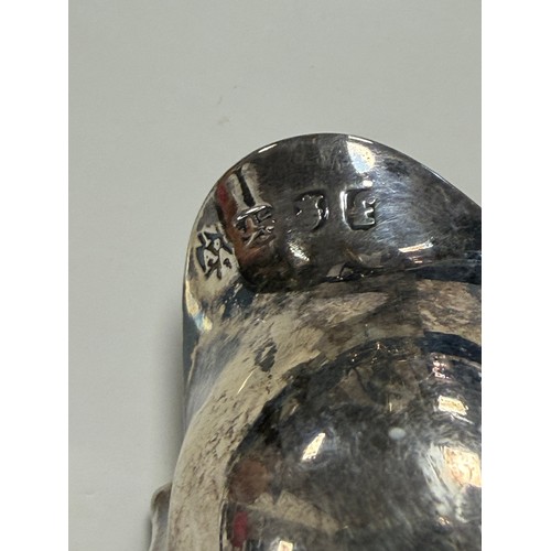 48 - A George IV silver toddy ladle, London 1821, with shaped bowl and ebony handle and another smaller e... 