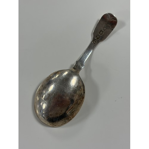 54 - A George IV silver caddy spoon, London 1828, with floral decoration to bowl and initialled handle  -