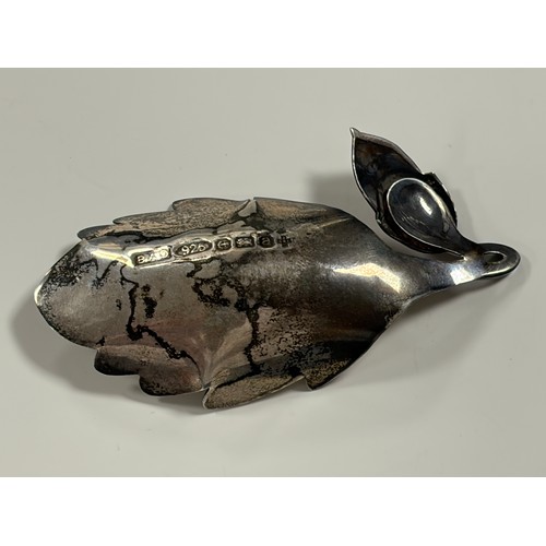 55 - An Elizabeth II silver caddy spoon, Birmingham 2000, of oak leaf and acorn design -