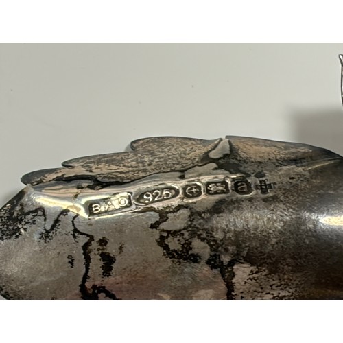 55 - An Elizabeth II silver caddy spoon, Birmingham 2000, of oak leaf and acorn design -