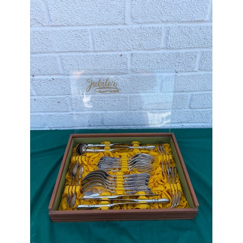 57 - A canteen of Polish white metal cutlery, stamped 800, for 6, in Jublier fitted case -
