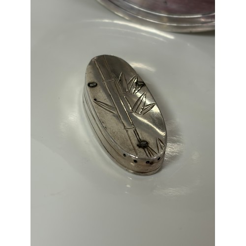 58 - Two  Chinese silver oval shaped snuff boxes, each stamped 950, with bamboo detail, together with a p... 