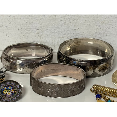 60 - An aesthetic style bangle, another silver bangle, micromosaic brooch, etc -