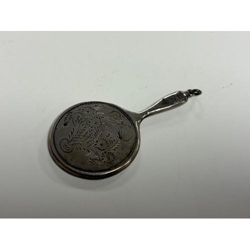 8 - An Edwardian silver fob pendant, in the form of a hand mirror -