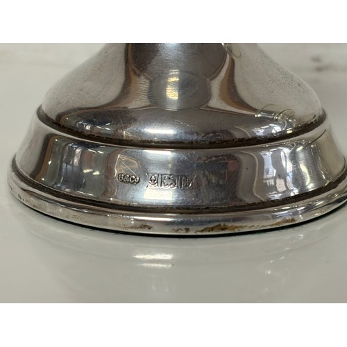 9 - A pair of Queen Elizabeth II silver dwarf candlesticks, Birmingham 1977 -