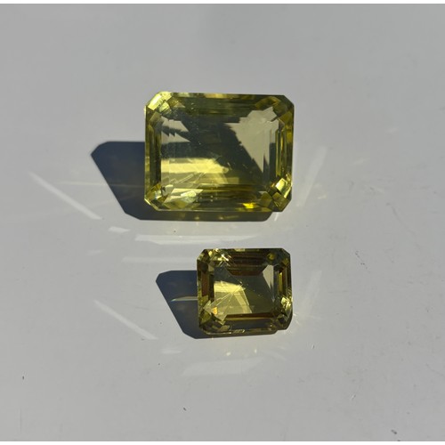 15 - A large rectangular step cut citrine, and a smaller example -