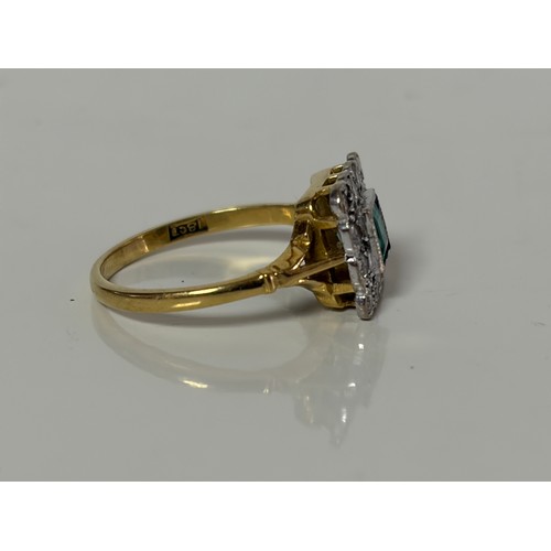 21 - An early 20th Century emerald and diamond cluster ring, the square emerald in a border of circular d... 