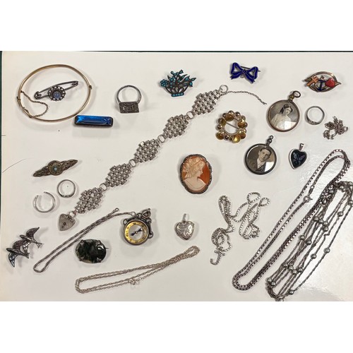 1 - A silver bracelet, various chains and pendants, silver rings, cameo brooch, etc -