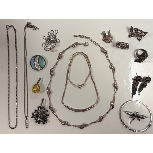 25 - A group of mostly silver items, to include silver necklaces, bangle (lacking one CZ), leaf ring, etc... 
