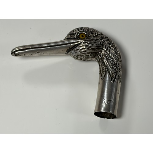 37 - An Edwardian silver cane/parasol handle, London 1907/1908, designed as a heron's head -