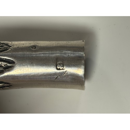 37 - An Edwardian silver cane/parasol handle, London 1907/1908, designed as a heron's head -