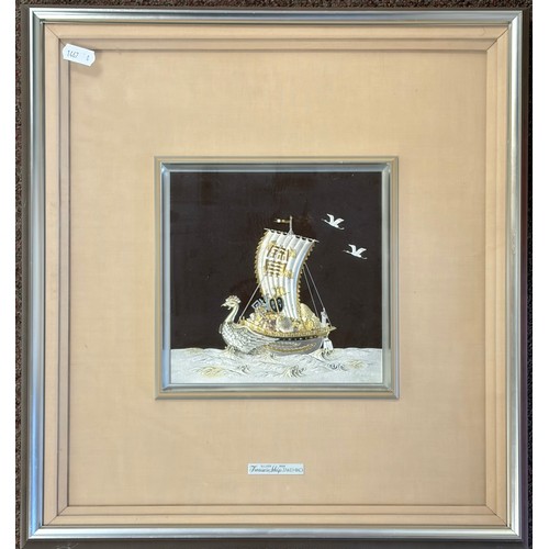 40 - A Japanese Takehiko silver treasure ship, framed -