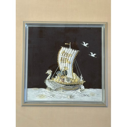 40 - A Japanese Takehiko silver treasure ship, framed -