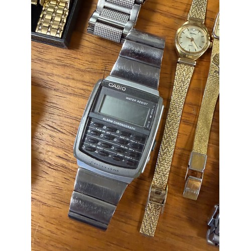 44 - A quantity of wristwatches, including Accurist, Sekonda, Casio calculator, etc and a silver cased op... 