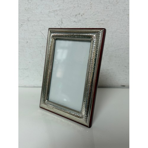 48 - An Italian silver mounted photograph frame -