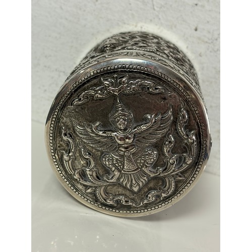 49 - A Siam silver cylindrical jar and cover, stamped Sterling 925, with repousse decoration, lined inter... 
