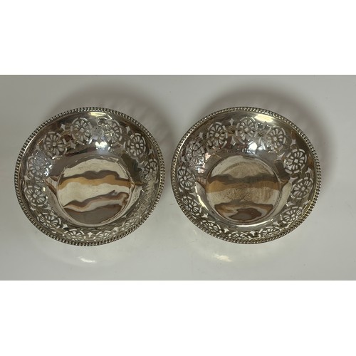 53 - A pair of George V silver pin dishes, Birmingham 1919, each with pierced sides and beaded rim -