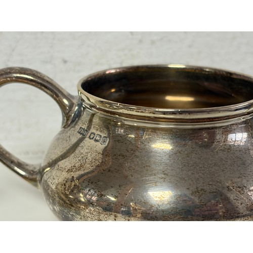 55 - A George V silver cream jug, and matching sugar bowl, Sheffield 1922 -